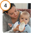 Woman drinking water after taking CREON® (pancrelipase) Delayed Release Capsules.